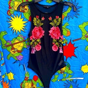 6S1.  Mind code body suit (women’s)